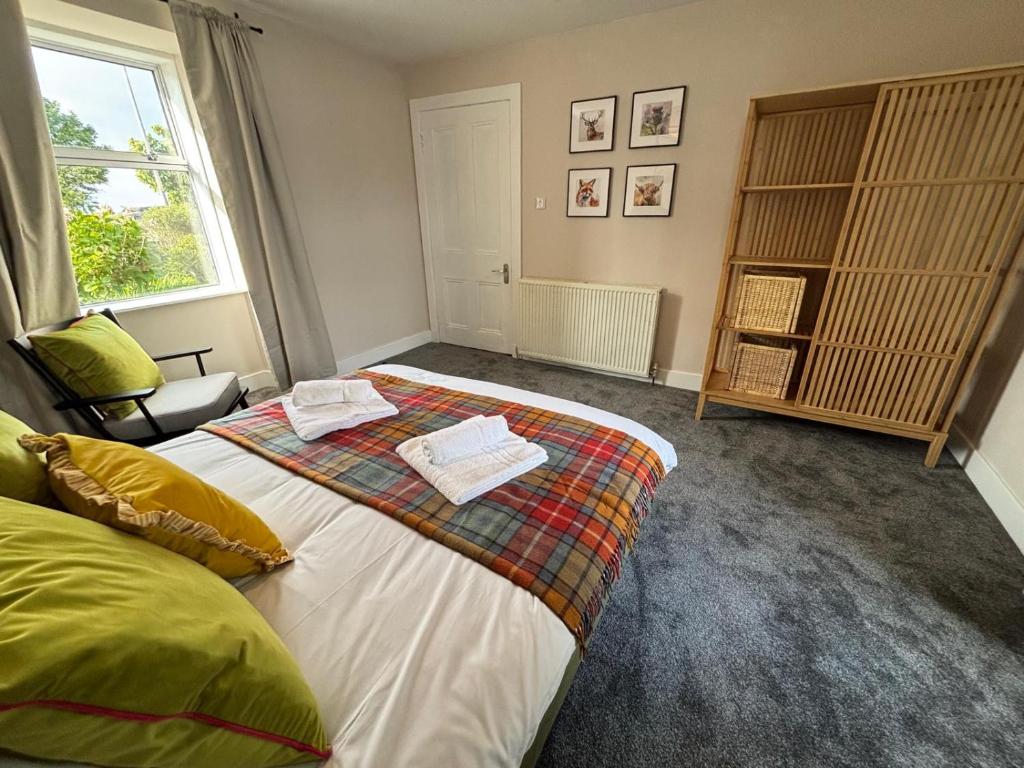 Postel nebo postele na pokoji v ubytování The Hebridean - Rooms & Apartments