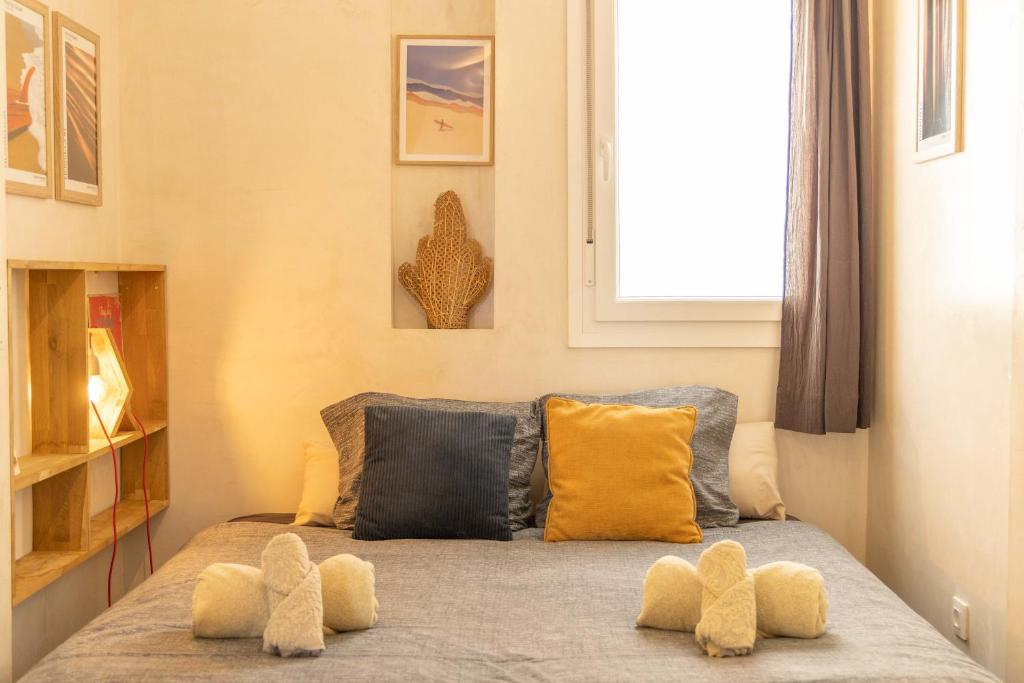 Postel nebo postele na pokoji v ubytování Tarifa Cozy House - Old Surf