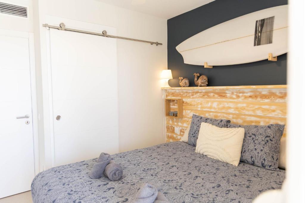Postel nebo postele na pokoji v ubytování Tarifa Cozy House - Old Surf