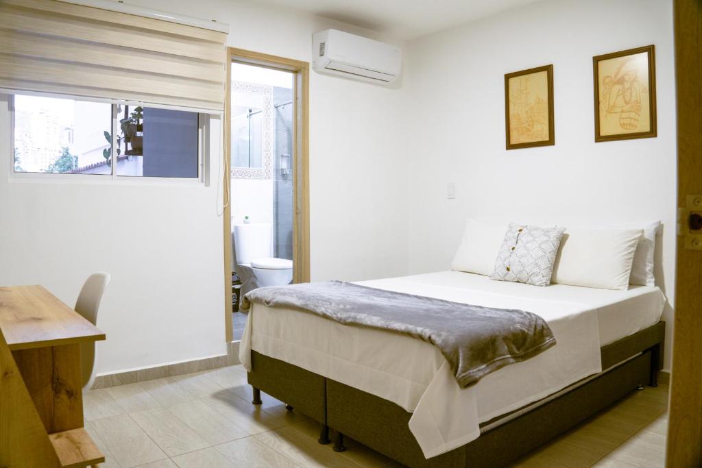 Postel nebo postele na pokoji v ubytování Casa Mompa