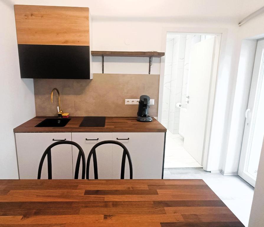 Kuchyň nebo kuchyňský kout v ubytování Vero Home