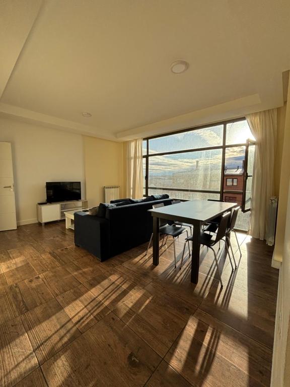 Et tv og/eller underholdning på Apartamentos Sur RG