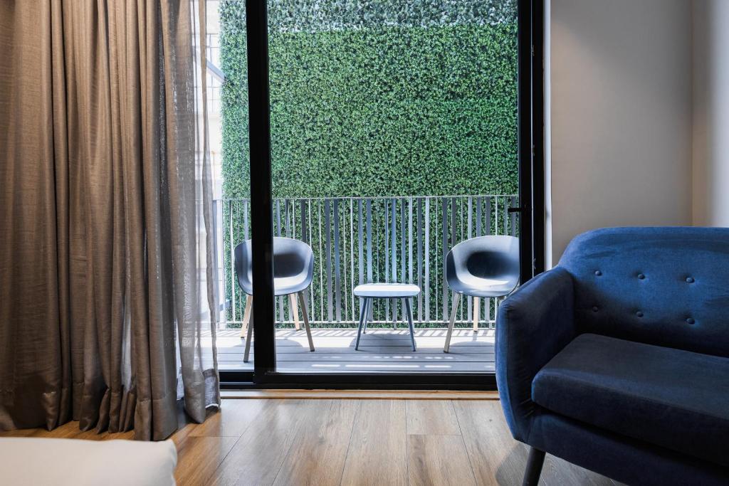 Posezení v ubytování Vuestro Hotel Boutique