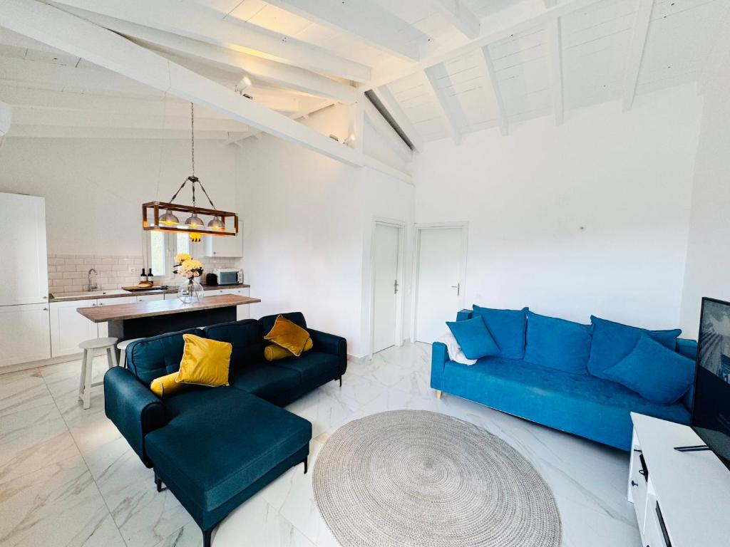 Posezení v ubytování Yellow House Kassiopi