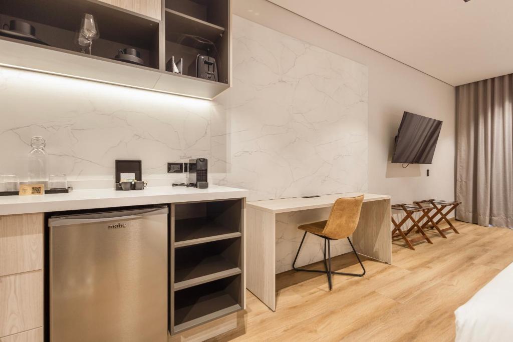 Kuchyň nebo kuchyňský kout v ubytování Vuestro Hotel Boutique