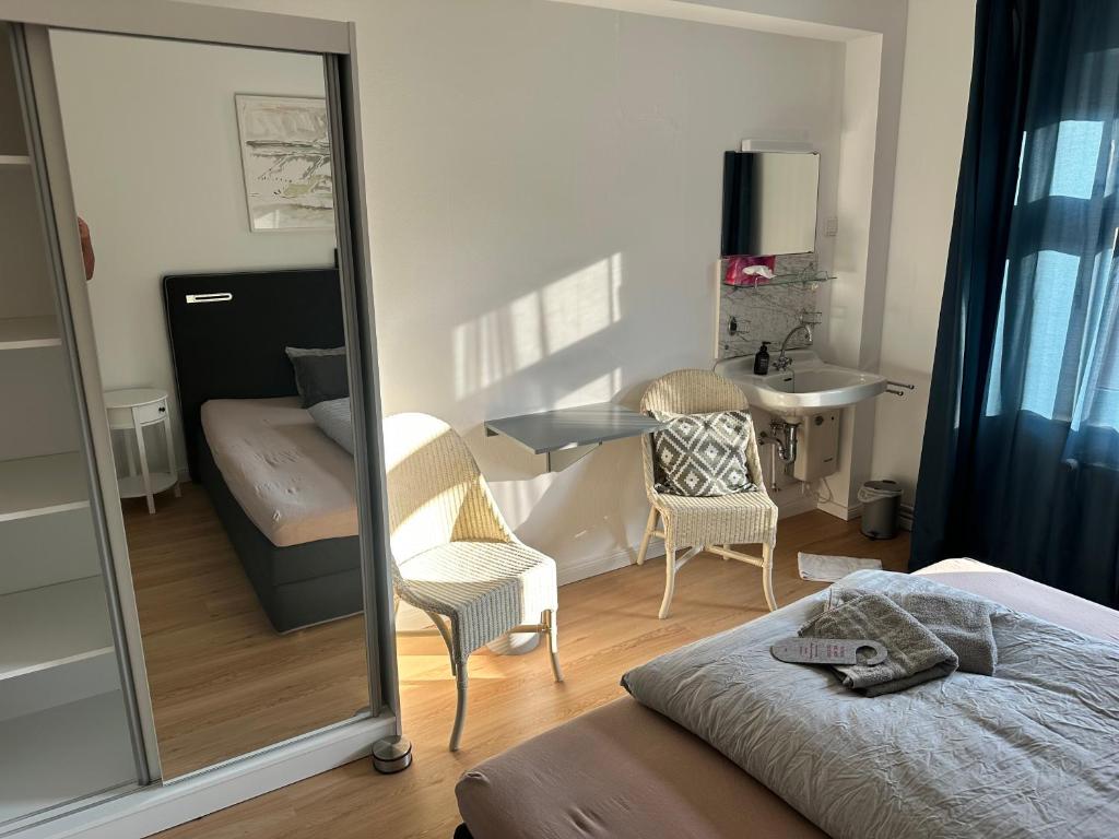 Postel nebo postele na pokoji v ubytování Villa Seestern