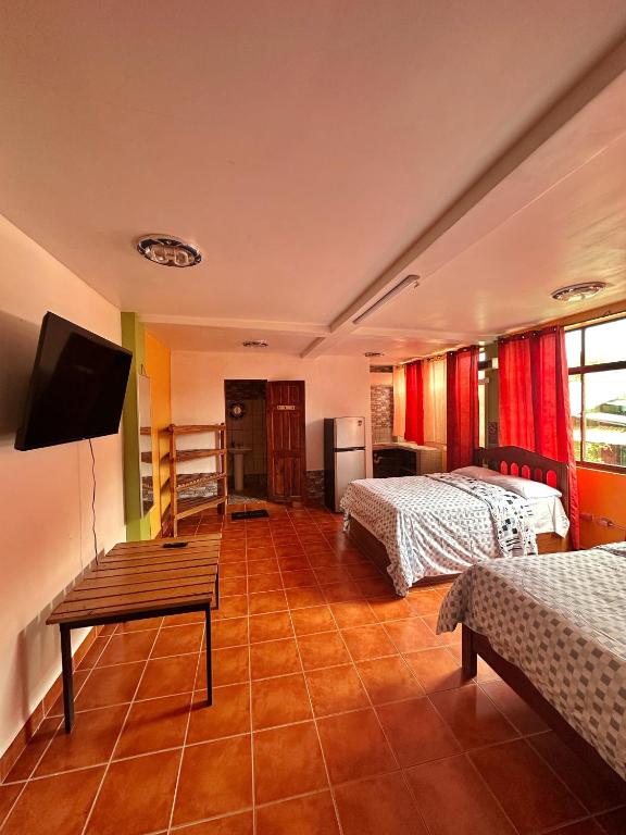 Postel nebo postele na pokoji v ubytování Sandy Toes Hostel