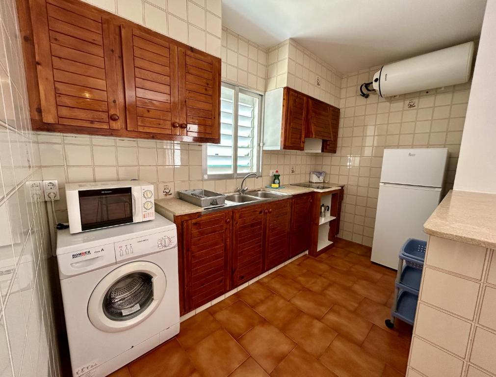 Kuchyň nebo kuchyňský kout v ubytování Aigua Dolça Santandria