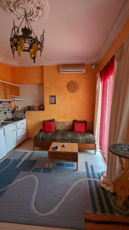Postel nebo postele na pokoji v ubytování Dar El Amen Appartements
