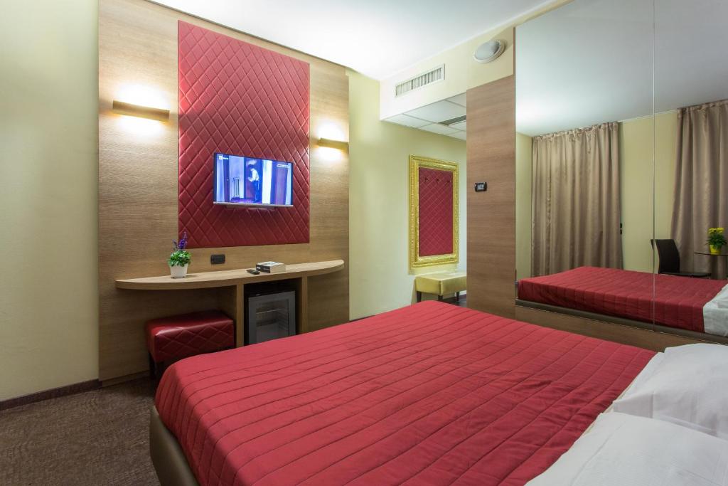 Postel nebo postele na pokoji v ubytování Break Hotel