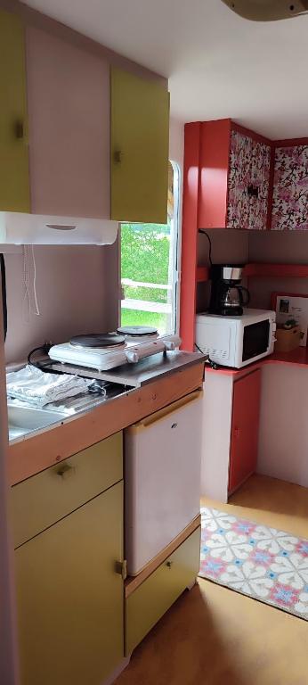 Kuchyň nebo kuchyňský kout v ubytování carazen , caravane chauffée