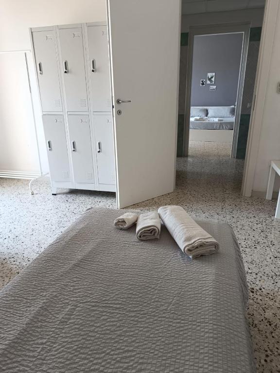 Voodi või voodid majutusasutuse Glemerald Hostel toas