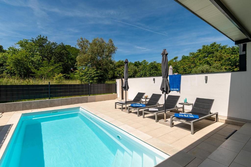 Bazén v ubytování Villa Relax Home Sun nebo v jeho okolí