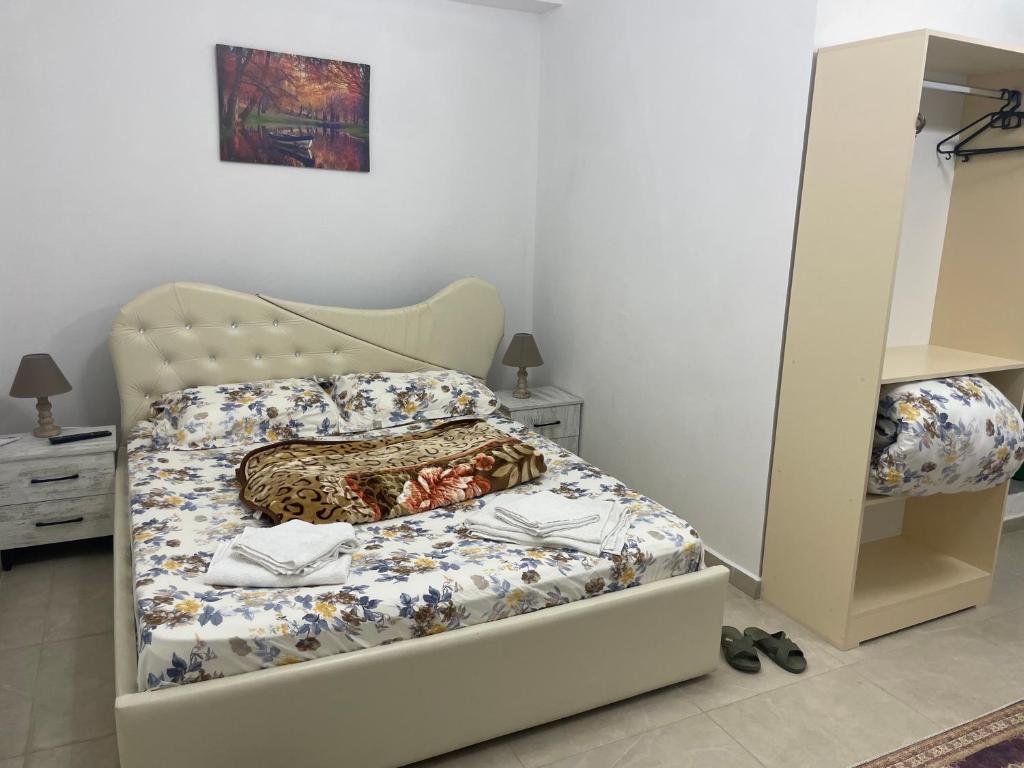 Postel nebo postele na pokoji v ubytování Guest House Banaj