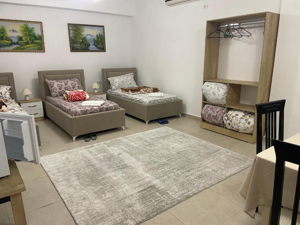 Postel nebo postele na pokoji v ubytování Guest House Banaj