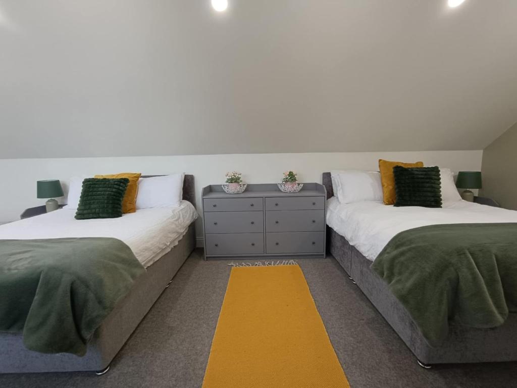 Postel nebo postele na pokoji v ubytování Mount Bolton Apartment