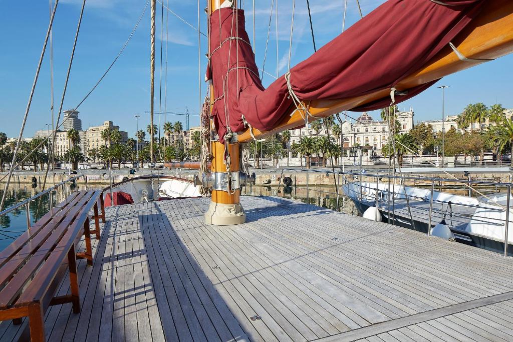 a wooden deck of a sail boat in the water at Southern Cross in Barcelona