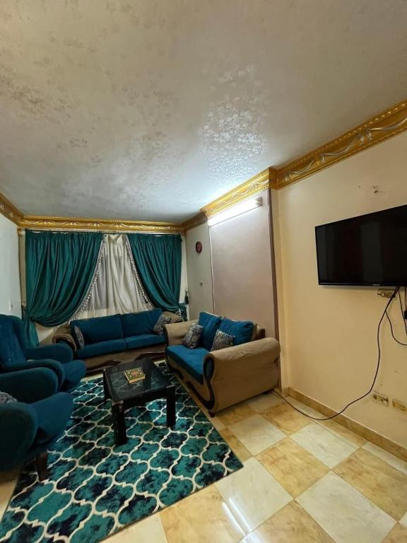 TV a/nebo společenská místnost v ubytování سونا موتل