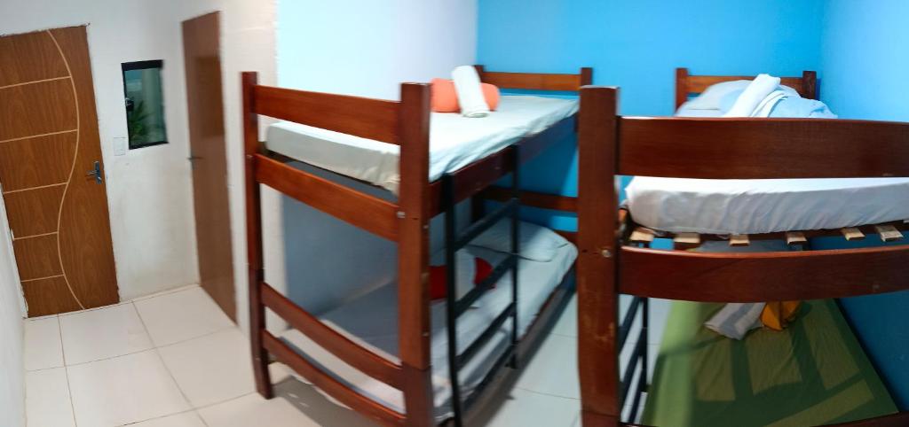Postel nebo postele na pokoji v ubytování Hostel Ladeira dos 4 Cantos