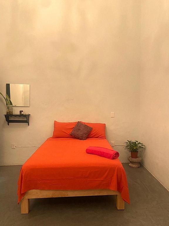 Postel nebo postele na pokoji v ubytování El Pinche Hostal