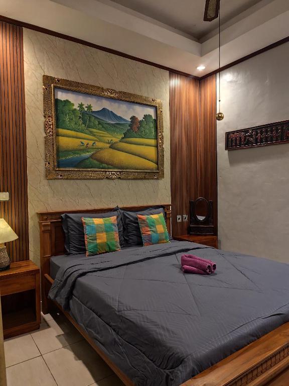 Postel nebo postele na pokoji v ubytování Geriya House