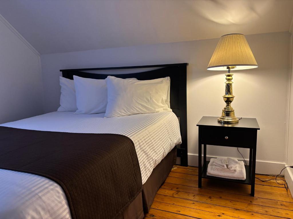 Postel nebo postele na pokoji v ubytování Maison vue Fleuve 4 chambres deux pas du traversier !