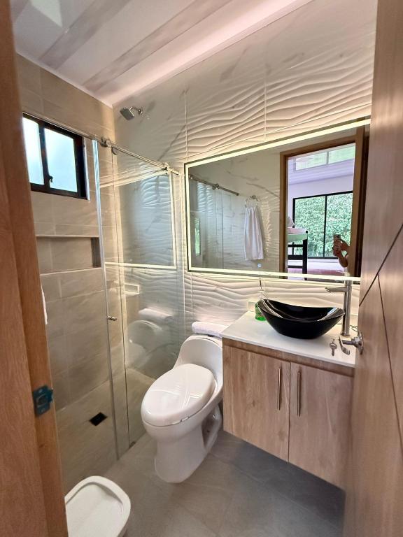 Koupelna v ubytování Cabaña moderna en Restrepo Meta
