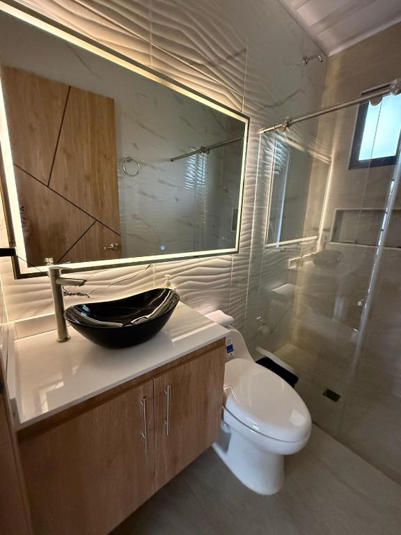 Koupelna v ubytování Cabaña moderna en Restrepo Meta