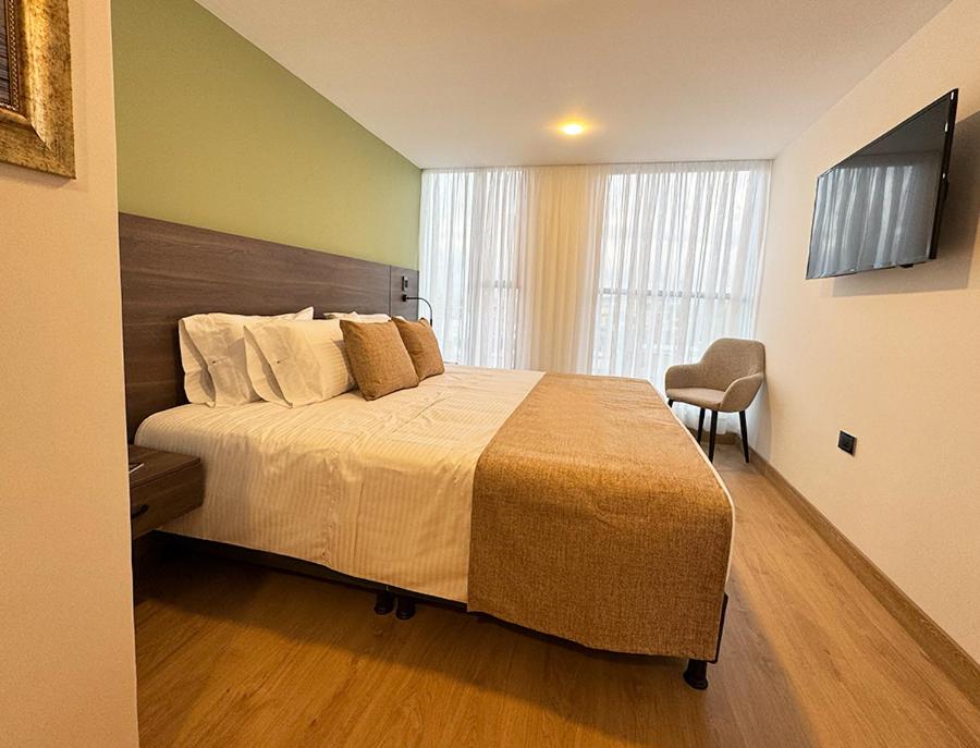 TV a/nebo společenská místnost v ubytování Entrenevados Hotel