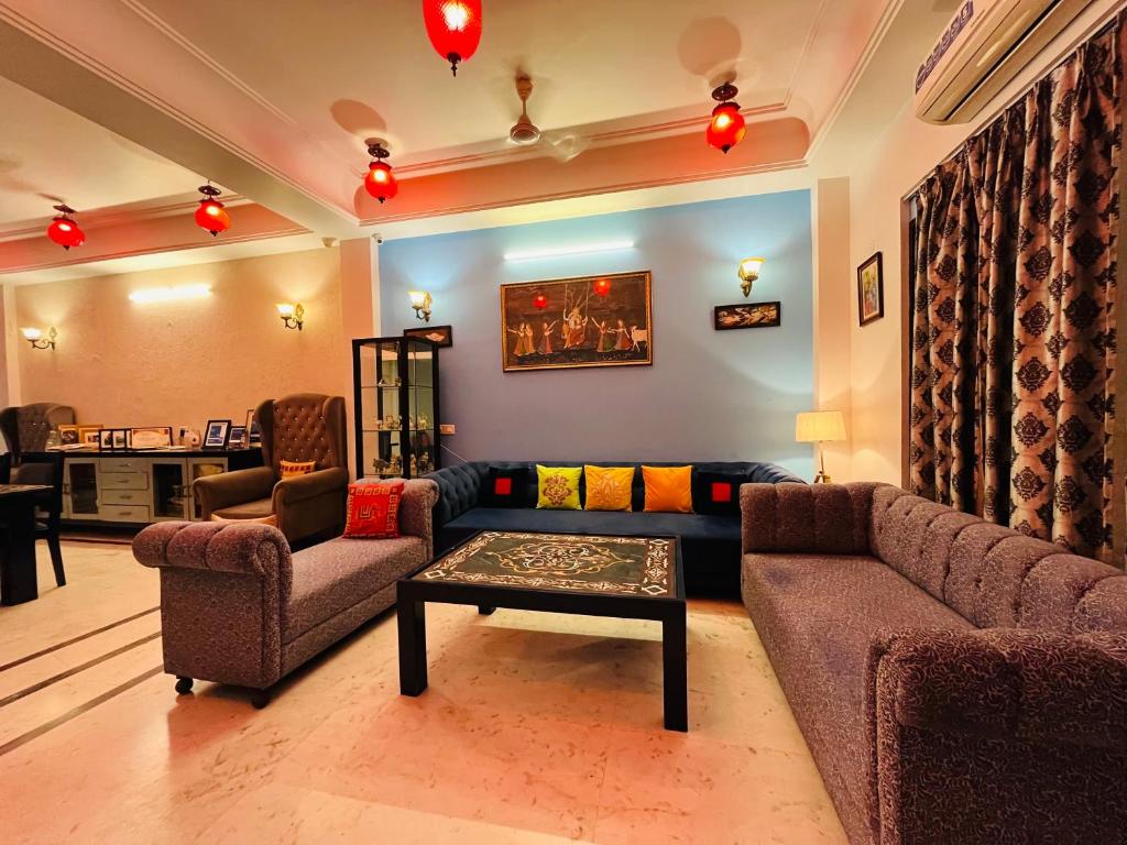 Zona de estar de Shiv Kothi - Homestay