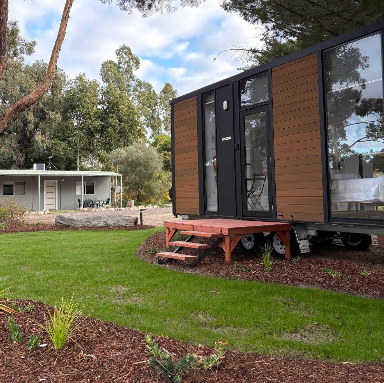 a tiny house on a trailer in a yard at Roses Gap View in Dadswells Bridge