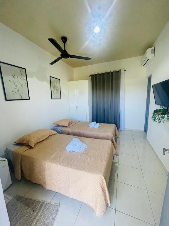 Postel nebo postele na pokoji v ubytování Hotel Casa Pierretta