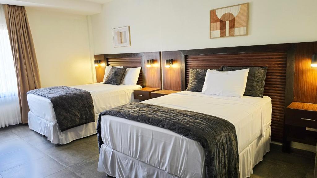 Posteľ alebo postele v izbe v ubytovaní Hotel Soliman