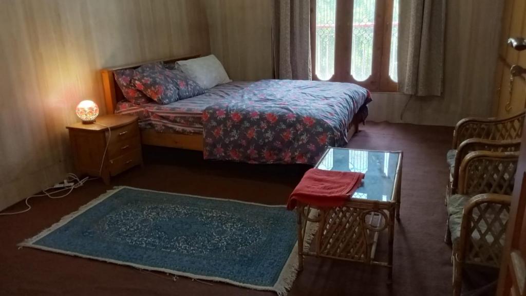 Voodi või voodid majutusasutuse Stay in Skardu toas