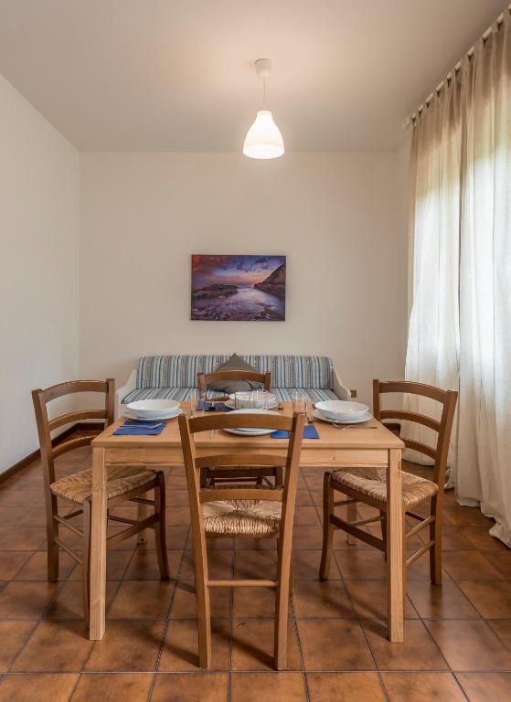 Posedenie v ubytovaní Caletta Apartments