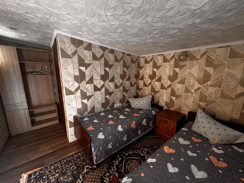 Postel nebo postele na pokoji v ubytování Helena guest house