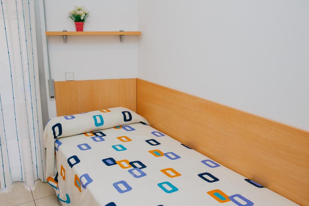 Postel nebo postele na pokoji v ubytování Apartamentos Navas
