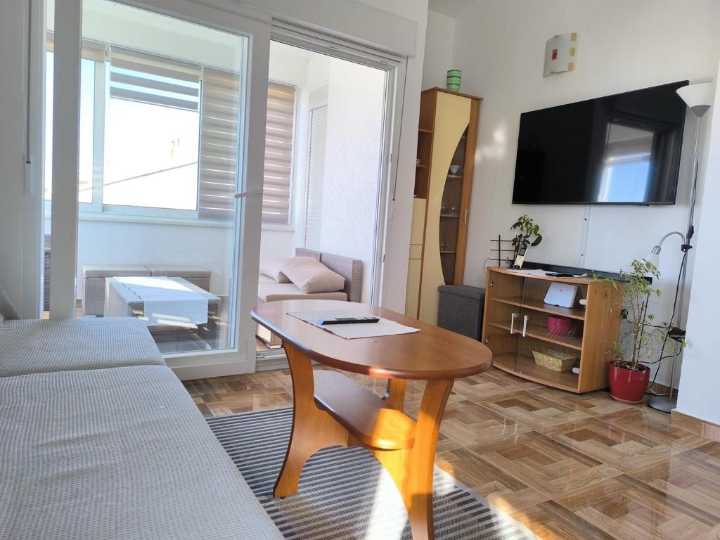 TV a/nebo společenská místnost v ubytování Apartment Magdalena