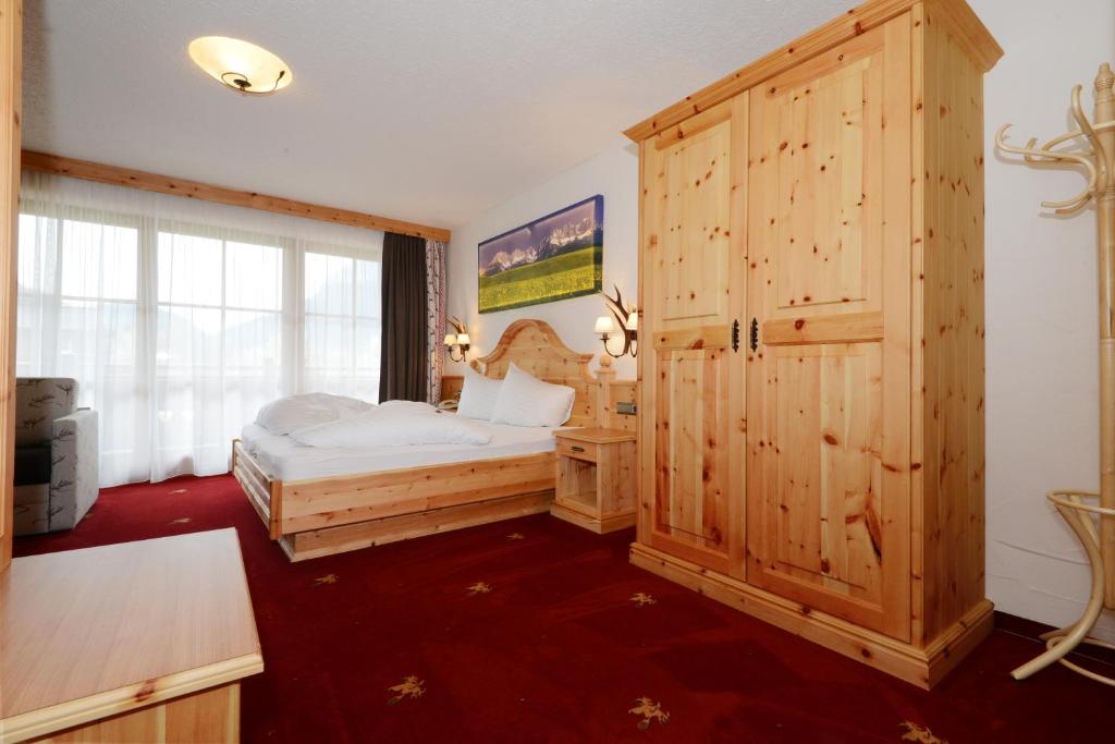 Letto o letti in una camera di Hotel Restaurant Hexenalm