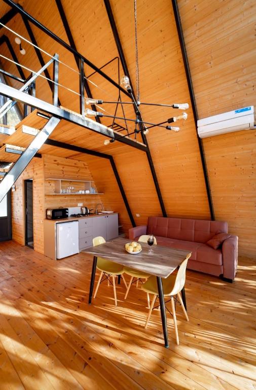 Kuchyň nebo kuchyňský kout v ubytování Gomarduli Cabins