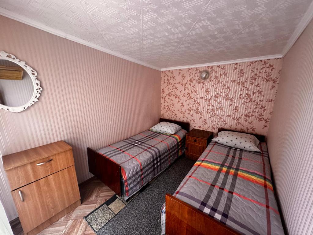 Postel nebo postele na pokoji v ubytování Helena guest house