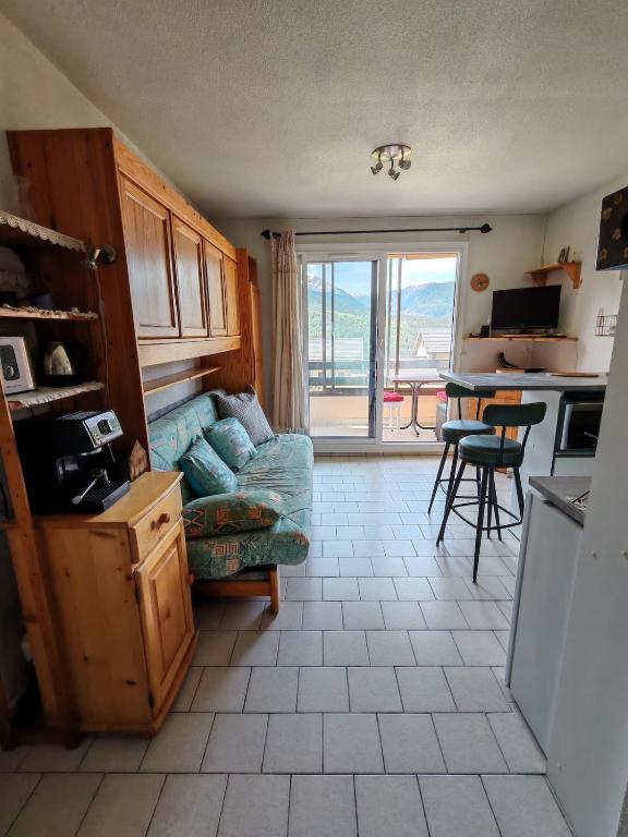 Kuchyň nebo kuchyňský kout v ubytování Calme et vue magnifique