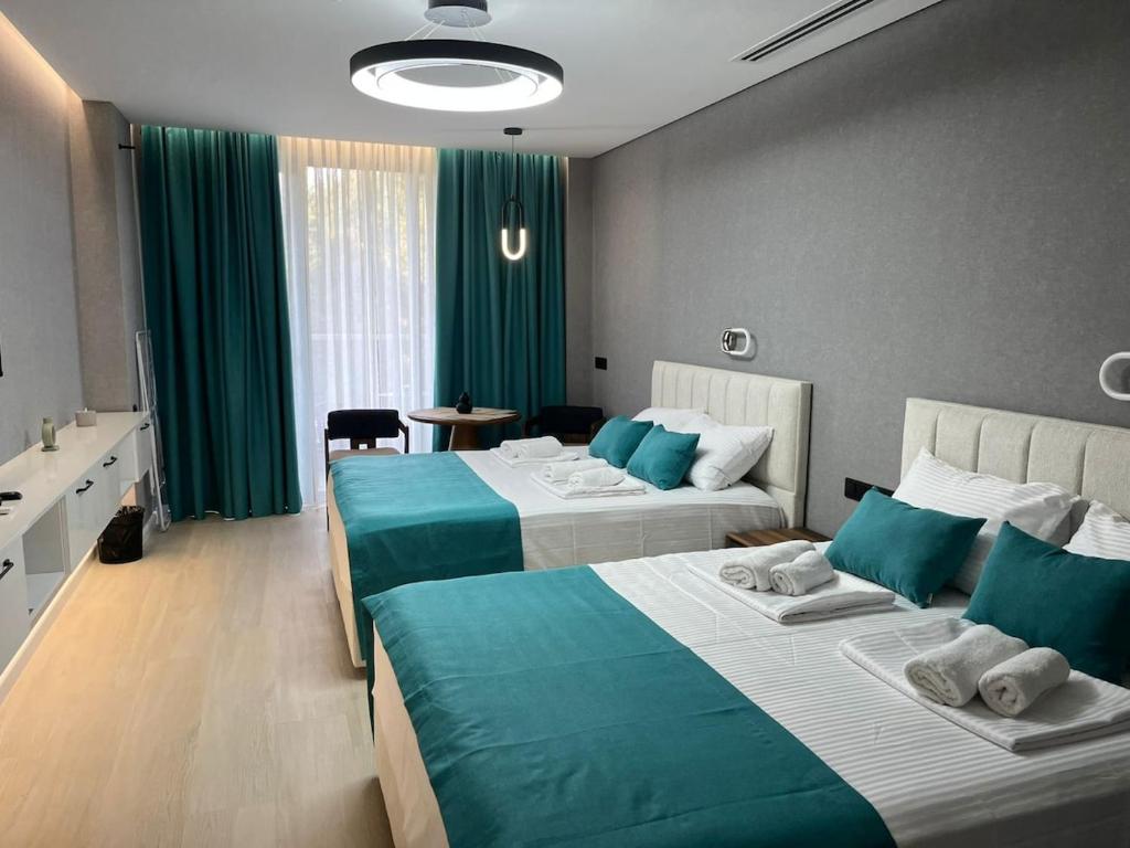Postel nebo postele na pokoji v ubytování Bamboo Beach Luxury Two Queens