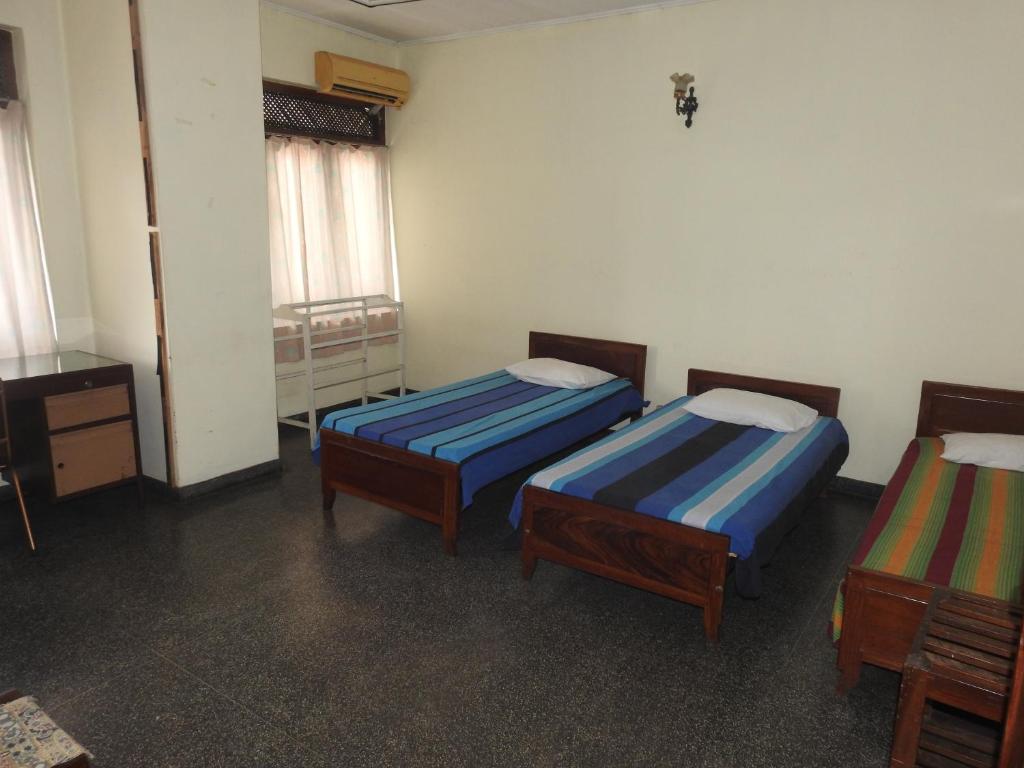 Postel nebo postele na pokoji v ubytování Serenity
