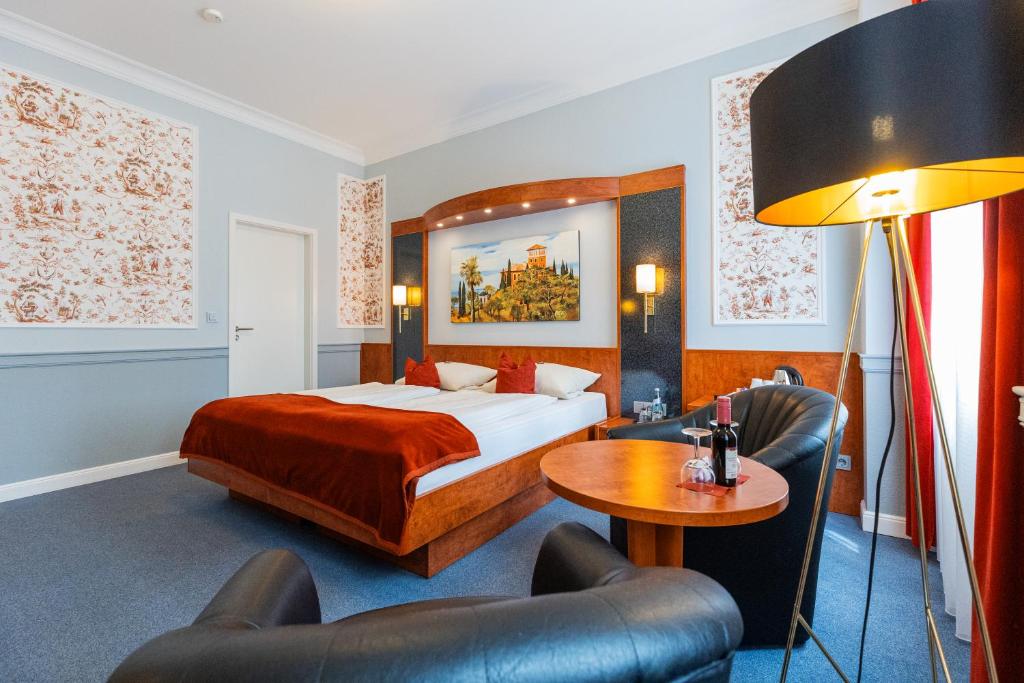 Postel nebo postele na pokoji v ubytování Hotel West an der Bockenheimer Warte