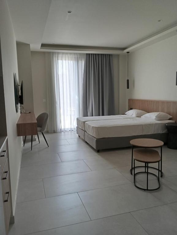 Postel nebo postele na pokoji v ubytování Lena Apartments