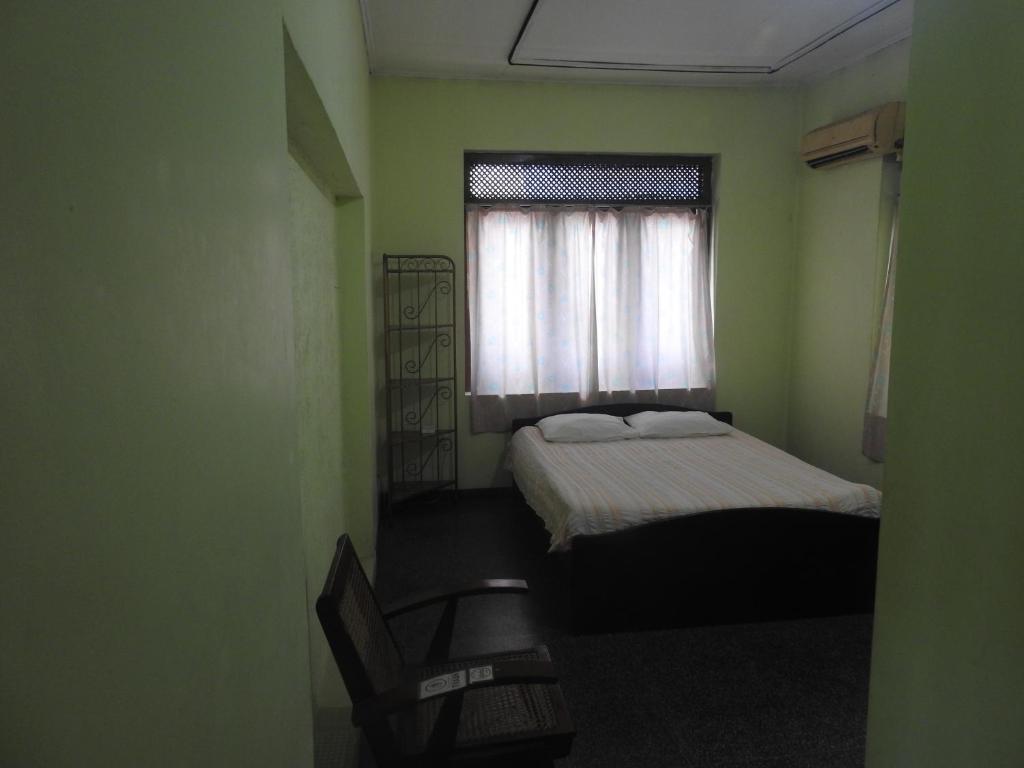 Postel nebo postele na pokoji v ubytování Serenity