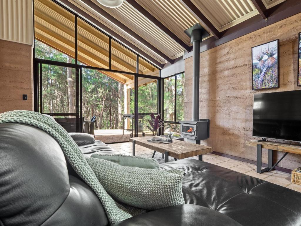 TV a/nebo společenská místnost v ubytování Marima Cottages