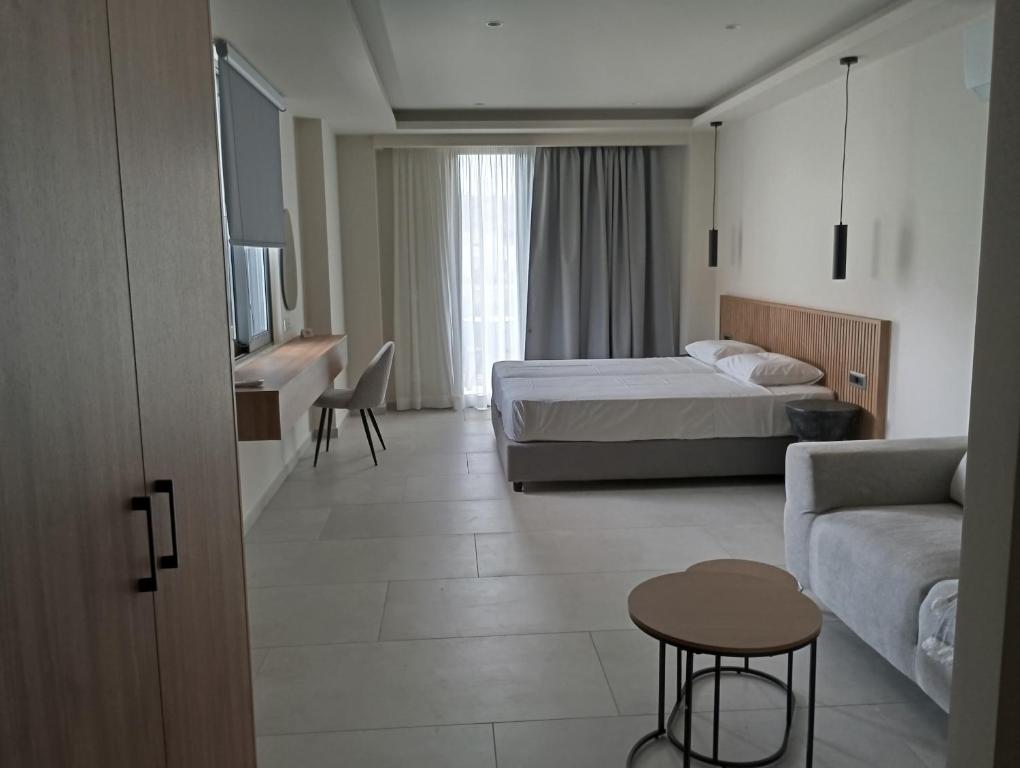 Postel nebo postele na pokoji v ubytování Lena Apartments