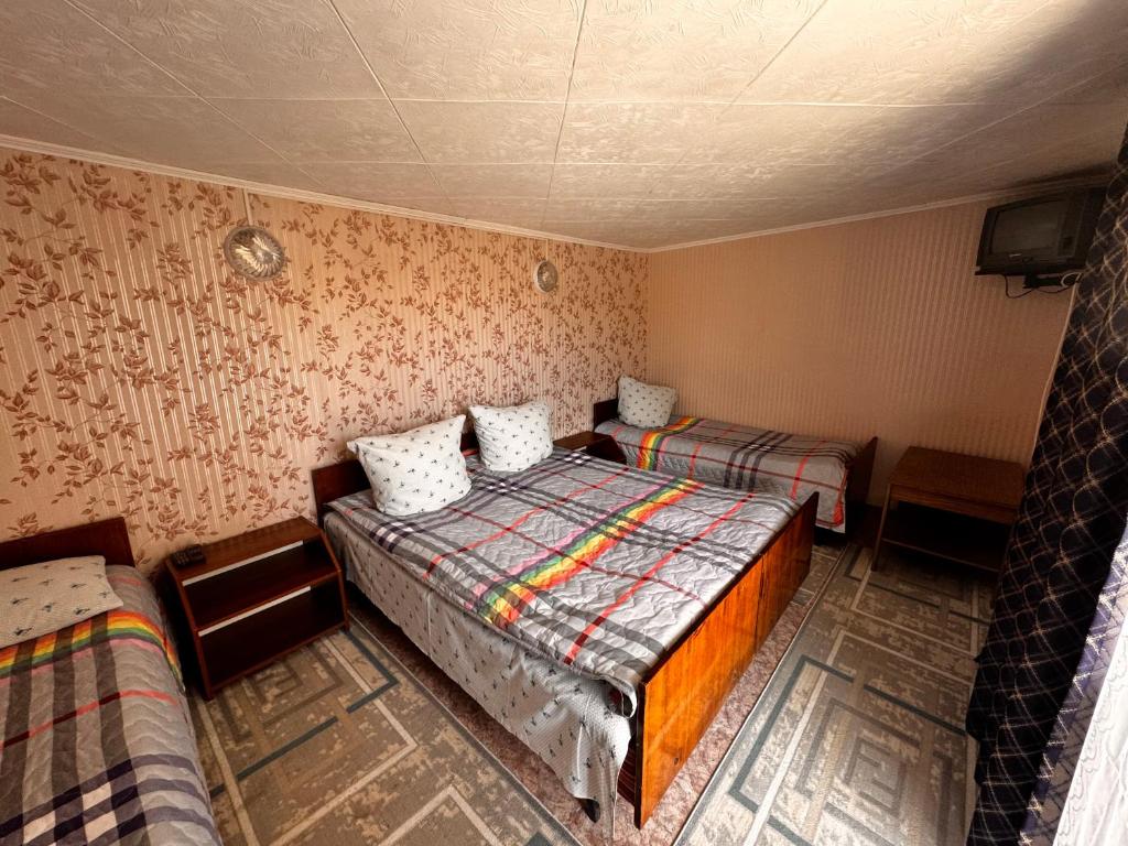 Postel nebo postele na pokoji v ubytování Helena guest house